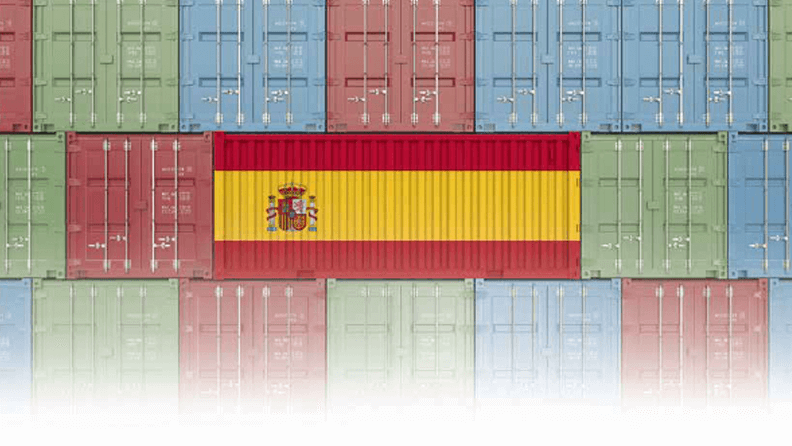 Contenedores de transporte marítimo con la bandera de España